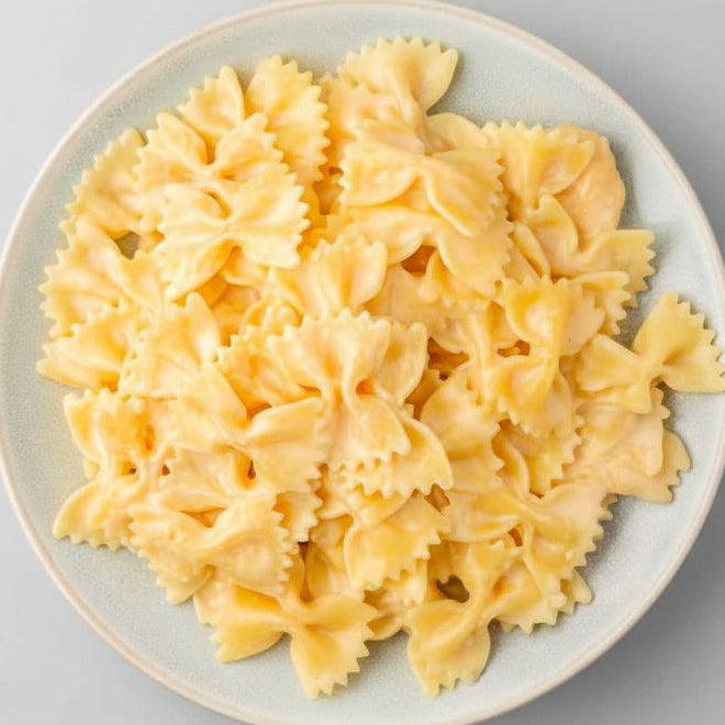 Bow tie pasta on a white plate