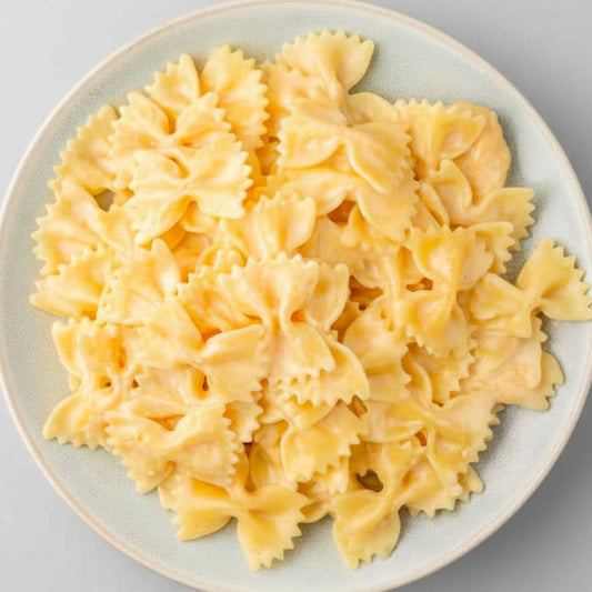 Bow tie pasta on a white plate